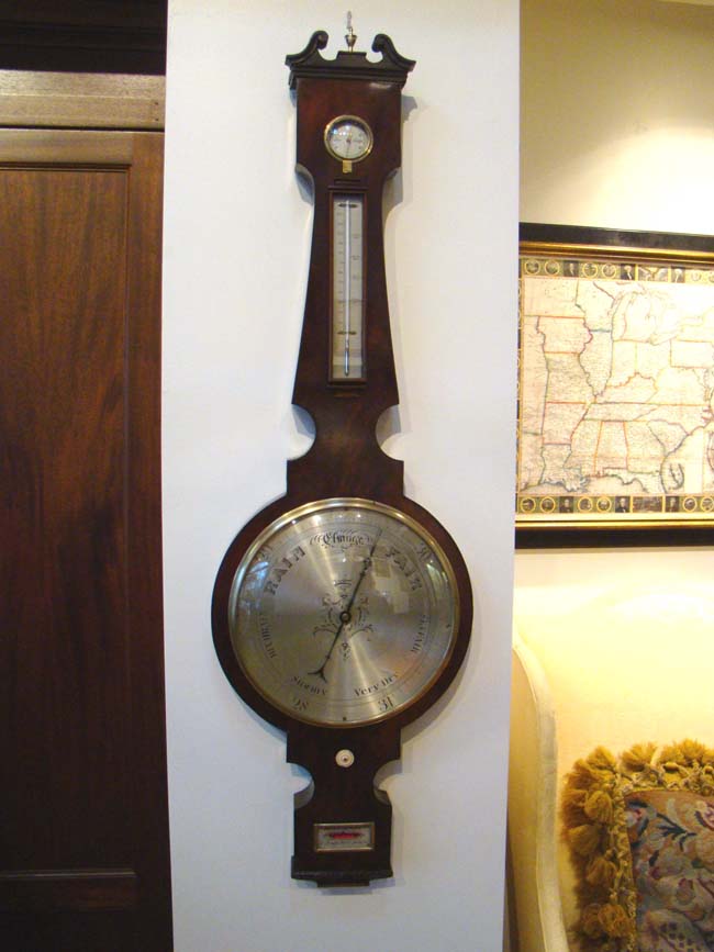 An English Wheel Barometer with 14 1/2" diameter engraved silvered dial by Henry Grimoldi circa 1850